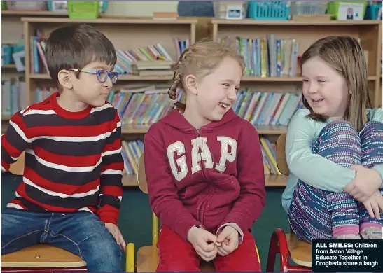  ??  ?? ALL SMILES: Children from Aston Village Educate Together in Drogheda share a laugh