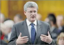  ?? Adrian Wyld/the Canadian Press ?? Prime Minister Stephen Harper said the details of any takeovers will only be released “when it is proper to do that.”