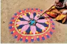  ??  ?? Kolam: A custom associated with Hindu New Year celebratio­ns