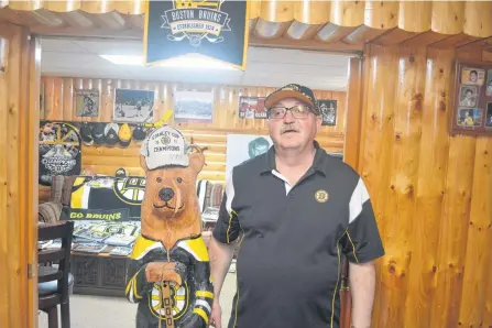  ?? NICHOLAS MERCER • SALTWIRE NETWORK ?? Bay Roberts’ Wayne Bishop has an entire den dedicated to the Boston Bruins and his love of hockey in general.