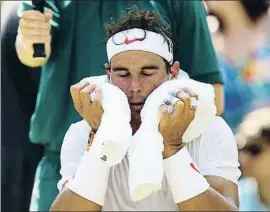  ?? CLIVE BRUNSKILL / GETTY ?? Nadal, en uno de los descansos del partido