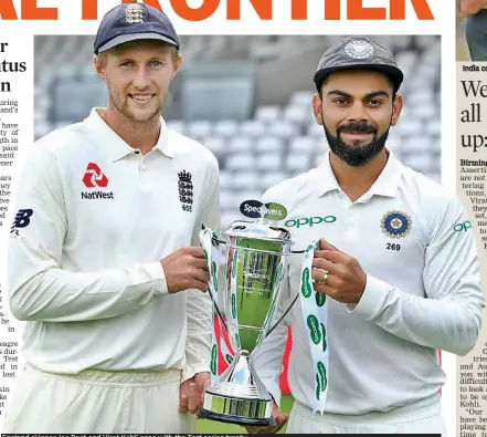  ??  ?? England skipper Joe Root and Virat Kohli pose with the Test series trophy.