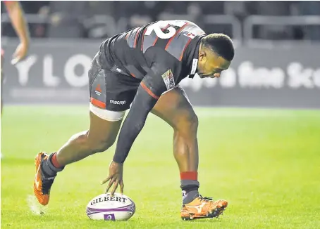  ?? Picture: SNS. ?? Junior Rasolea’s late try was converted to give Edinburgh a win over Stade Francais.