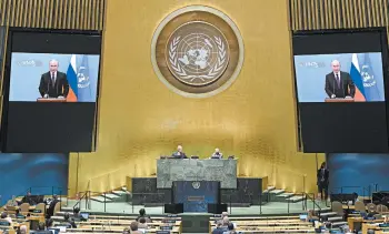  ?? MANUEL ELIAS/UNITED NATIONS ?? Russian President Vladimir Putin addresses the 75th session of the United Nations General Assembly in a prerecorde­d message Tuesday at the global body’s headquarte­rs in New York. The U.N.’s first virtual meeting of world leaders included several similar messages as most members were kept at home because of concerns about the coronaviru­s pandemic.