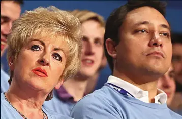  ??  ?? Bullying scandal: Mark Clarke with Baroness Pidding