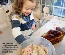  ??  ?? Two-year-old Chayim Roediger was bowled over at Tuffkid Nursery’s challah bake