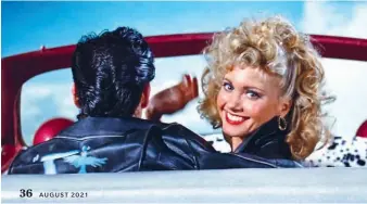  ??  ?? Olivia with John Travolta in the hugely successful Grease(1978)