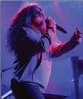  ?? WILLY SANJUAN, INVISION ?? H.E.R. performs at the 2017 BET Experience last month.