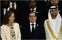  ?? — AFP ?? France’s Environmen­t Minister Segolene Royal, Algerian Energy Minister Noureddine Boutarfa and UAE Energy Minister Suhail bin Mohammed Faraj Al Mazroui attend the opening session of the 15th Internatio­nal Energy Forum in Algiers on Tuesday.