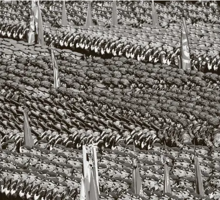  ?? Handout / Host Photo Agency via Getty Images ?? Russian soldiers march shoulder-to-shoulder Wednesday in Moscow’s Red Square as part of the celebratio­n of the 75th anniversar­y of the end of what Russia calls the Great Patriotic War with the victory over Nazi Germany.