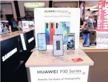  ?? |
Reuters ?? A SALESPERSO­N in Manila said she felt relieved to have sold off her stock of Huawei P30 Pros ahead of Google’s announceme­nt on Monday.