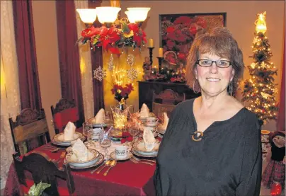  ?? MILLICENT MCKAY/JOURNAL PIONEER ?? Paula Arsenault of Mont-Carmel has opened her home for Christmas House tours for three years. But there is one stipulatio­n; tour participan­ts must bring a non-perishable food item that will later be donated to a family in need.