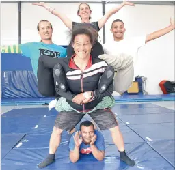  ?? PICTURE: JASON BOUD ?? TOURISTS: The Action Arte Foundation in Epping Industria, is taking young artistes from Hanover Park to the African Circus Arts Festival in Ethiopia. From left: Francois Roos, Hanne La Cour, Shameer Johnson, Khadeejah Abels, centre and Arashaad Goliath, on the mat.