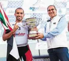  ?? Courtesy: Khalifa Bel Selah ?? Clear winner The UAE’s Khalifa Bel Selah receives his trophy from UIM President Dr Raffaele Chiulli after winning the Italian GP.