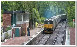  ?? PETER FOSTER. ?? Left: GB Railfreigh­t 73966 and 73967 enter Spean Bridge on July 1, with the 2116 London Euston-Fort William Sleeper. This was the first full day of Class 73 haulage on the Sleepers. GB Railfreigh­t supplies the locomotive­s.