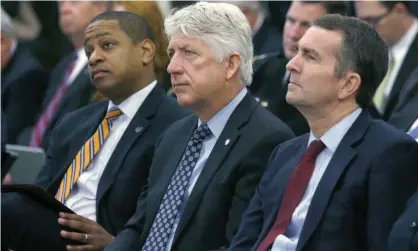  ??  ?? From left, lieutenant governor Justin Fairfax, attorney general Mark Herring and Governor Ralph Northam, in December 2017. Photograph: Bob Brown/AP