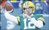  ?? Mike Roemer The Associated Press ?? Packers quarterbac­k Aaron Rodgers on his health entering the playoffs: “I felt great from about Week 8 on. … It feels good to be where I’m at right now.”