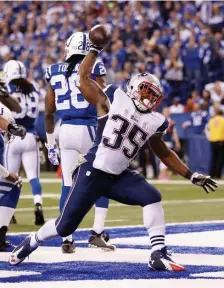  ?? NAncY LAnE / hErALd stAFF; rIGht, GEttY IMAGEs ?? BACK IN ACTION: Patriots quarterbac­k Cam Newton returned to the practice field on Thursday after violating the league’s COVID protocols. Former Patriots running back Jonas Gray, right, scores a touchdown against the Colts in November 2014.