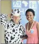  ?? PICTURE: GAMEPLAN MEDIA ?? MOO-VER: Midmar Mile veteran Mike Arbuthnot, 84, will be dressed as a cow to raise funds for CHOC, a children’s cancer charity. With him is The Cows co-ordinator, Ntobeko Zama.