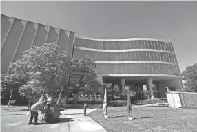  ??  ?? Preparatio­ns are made outside the former Commercial Appeal building prior to a visit by Gov. Bill Lee as the overflow hospital is handed over from the Army Corps of Engineers following renovation­s.