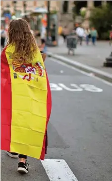  ?? APA ?? Viele stolze Katalanen fühlen sich gleichzeit­ig auch als stolze Spanier