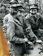  ??  ?? Queen Elizabeth in a boiler suit as an army mechanic during the war