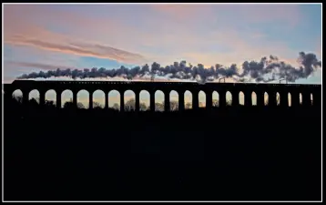  ?? ?? Ï
Timings are so important. When LNER A4 Pacific No. 60009 Union of South Africa was departing King’s Cross in the dark on December 14, 2013, I worked out that sunrise would be around Digswell Viaduct. As it happened, sunrise came minutes after this shot but it did not disappoint. Standing well back gave the opportunit­y for a close-up shot and a wide angle with the complete viaduct.
ISO 160, shutter speed 640th, aperture f5.6.