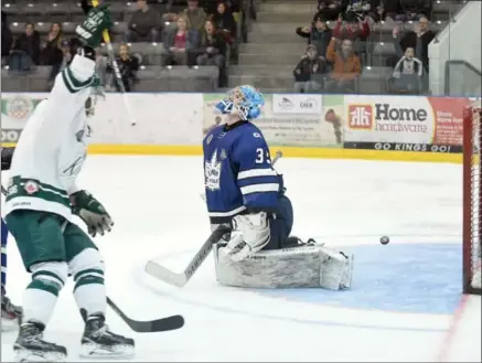  ?? DAVID BEBEE, RECORD STAFF ?? London Nationals goalie Cameron Zanussi looks skyward as Elmira Sugar Kings’ Ethan Skinner celebrates scoring on a breakaway Sunday. Elmira won the game, 4-1. Elmira could wrap up the series Wednesday. Game time 7:30 p.m. in Elmira.