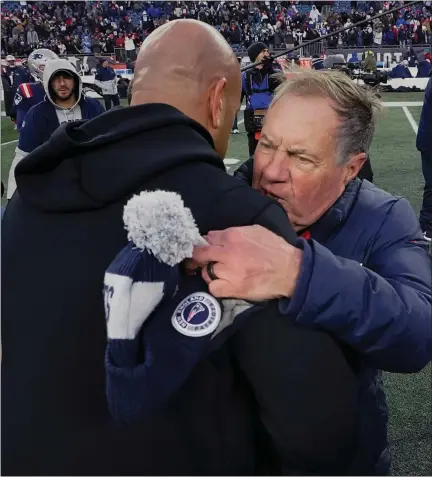  ?? STEVEN SENNE, AP ?? New England Patriots head coach Bill Belichick, right, will match wits with New York Jets coach Robert Saleh on Sunday.