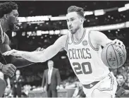  ?? Adam Glanzman / Getty Images ?? The Celtics’ Gordon Hayward, right, played for the first time since being injured in last season’s opener.