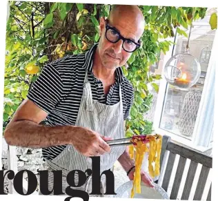  ?? ?? Cooking up a storm: Stanley Tucci enjoying Italian food