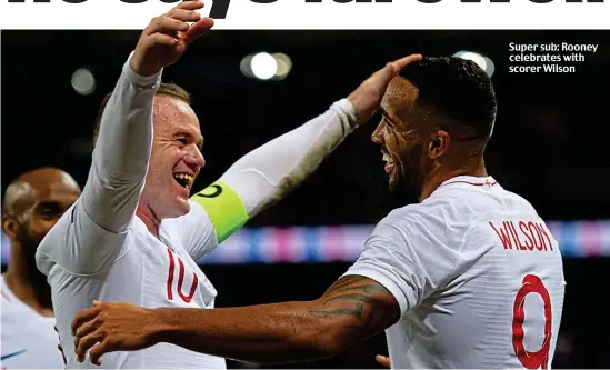  ??  ?? Super sub: Rooney celebrates with scorer Wilson