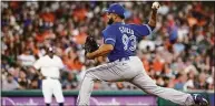  ?? Godofredo A. Vásquez / Staff photograph­er ?? Toronto Blue Jays relief pitcher Yimi Garcia throws the ball against the Houston Astros during the eighth inning on April 23 in Houston.