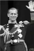  ?? Leslie Priest ?? Prince Philip, Duke of Edinburgh, waves to supporters from the balcony at Buckingham Palace on June 2, 1953.