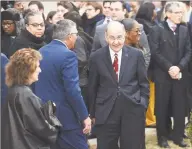  ?? Arnold Gold / Hearst Connecticu­t Media ?? President Pro Tempore of the Connecticu­t State Senate Martin Looney, center, speaks with Republican state Sen. Len Fasano in a 2019 image.