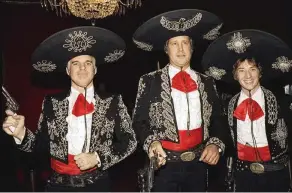  ?? FRANKIE ZITHS / AP ?? Steve Martin, Chevy Chase and Martin Short appear in costume at the premiere of their film “Three Amigos!” in New York in 1986. Martin is the subject of a new documentar­y, “Steve! (Martin) a Documentar­y in 2 Pieces,” that debuted Friday on Apple TV+.
