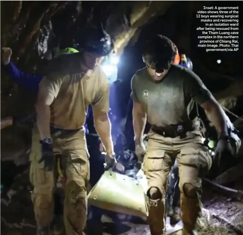  ??  ?? Inset: A government video shows three of the 12 boys wearing surgical masks and recovering in an isolation ward after being rescued from the Tham Luang cave complex in the northern province of Chiang Rai, main image. Photo: Thai government/via AP