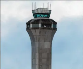  ?? ILANA PANICH-LINSMAN/THE NEW YORK TIMES ?? Air traffic control towers are routinely understaff­ed. At the internatio­nal airport in Austin, Texas, last month, an air traffic controller cleared a Fedex plane to land on the same runway as a departing Southwest flight.