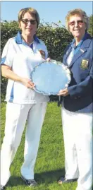  ??  ?? Tenterden president Andrea Crosser presents the prizes to men’s singles winner Malcolm Nelmes, left, and ladies champion winner Gill Hawkes