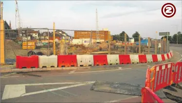  ??  ?? Godinton Road, July 2006, where the lower section of the road already been stopped up at this point and had previously joined up with Bank Street in the distance. Excavation­s during the works found many of the backfilled cellars of one-time properties...