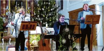  ?? Foto: Michaela Krämer ?? Die St. Martin Kirche in Horgau bildete den feierliche­n Rahmen für ein wundervoll­es Konzert, das noch lange nachwirkte: (von links) Gertrud Kröner, Peter Frasch und Martin Kröner.