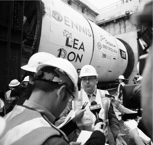  ?? COLIN O’CONNOR FOR NATIONAL POST ?? Metrolinx CEO Bruce McCuaig speaks to media at a Black Creek Drive constructi­on site. He says he’s trying to clear up uncertaint­y caused by a city council about-face that saw Toronto switch its support from an LRT to a subway in Scarboroug­h.