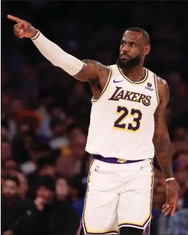  ?? AL BELLO – GETTY IMAGES ?? Prior to Saturday night's game against the Knicks, Lakers star LeBron James said he hasn't thought about the $51.4 million option he has for the 2024-25 season.