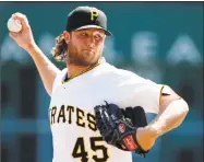  ?? Gene J. Puskar / Associated Press ?? The Yankees have spoken to the Pirates about trading for right-hander Gerrit Cole, but no deal was imminent as of Friday, according to a source.