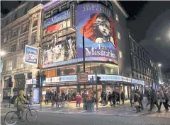  ??  ?? Theatregoe­rs for an evening show of Les Miserables at Queen’s Theatre.