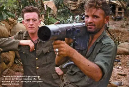  ??  ?? Corporal Butch Mcmanus (right) holding an 84mm Carl Gustav recoilless rifle. This anti-tank gun could inflict great damage on advancing infantry