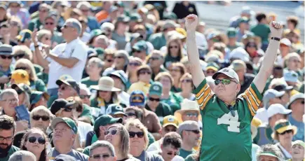  ?? See stories in Sports. PHOTOS BY SARAH KLOEPPING/USA TODAY NETWORK-WISCONSIN ?? Packers shareholde­rs attend the annual meeting Wednesday at Lambeau Field. The team also released veteran defensive lineman Mike Daniels.