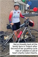  ?? ?? Nerys Howells back at the family farm in Trelech after the end of her gruelling cycle ride of 1,560km in aid of heart charity Calon Hearts.