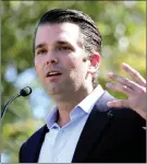  ?? The Associated Press ?? A report claims that Donald Trump Jr., the U.S. president’s oldest son, met with a Russian lawyers soon after his father clinched the Republicia­n nomination.