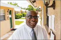  ?? GREG LOVETT / THE PALM BEACH POST ?? Calvin Phillips, 53, is director of reentry and men’s services at The Lord’s Place Men’s Campus in Boynton Beach. He’s worked at the nonprofit for seven years.